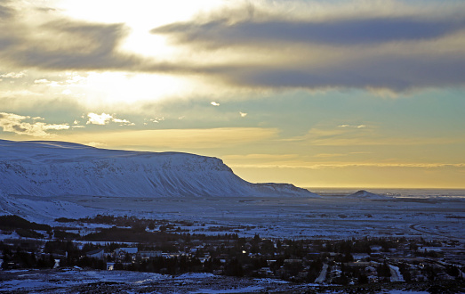 A mountain near Hveragerði in southwest Iceland, covered in snow on a cold February day.
