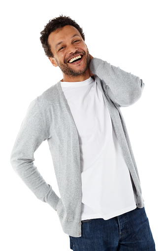 Portrait of cheerful mature african man standing on white background