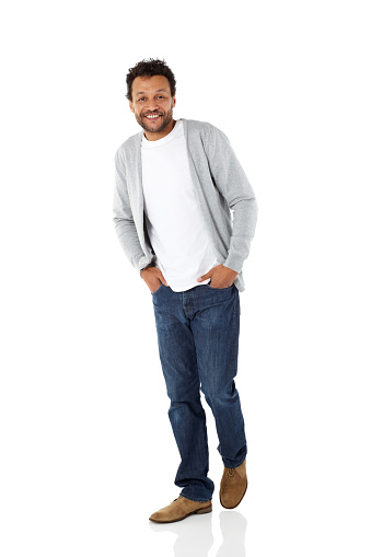 Full length portrait of stylish mature african male model posing in casuals over white background