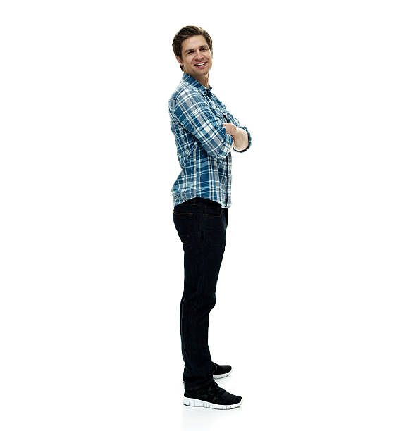 istock Smiling casual man standing with arms crossed 502618018
