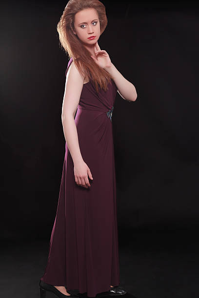 istock Lovely Female Model Standing with Hand on Chin 502618527