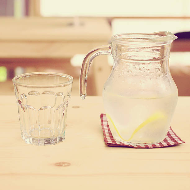 istock Jar of lemonade with empty glass for summer 502620195