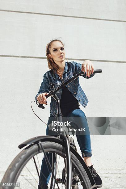 Young Woman Hipster Standing With Black Bike Stock Photo - Download Image Now - Activity, Adult, Arts Culture and Entertainment