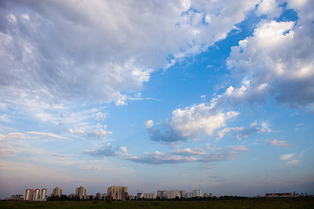 Urban landscape. Kyiv (Ukraine) high-rise buildings and cloudy sky.