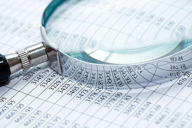 Magnifying Glass On Digits stock photo