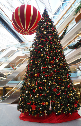 Giant Christmas tree and - ball in shopping center