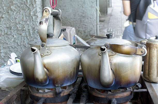 istock Old classic kettles for boiling water on stove 502633678