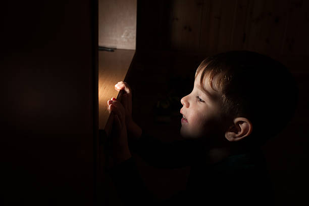 istock Portrait of a Child Lying by Night 502637096