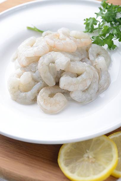 istock raw peel prawns in a white bowl 502638496