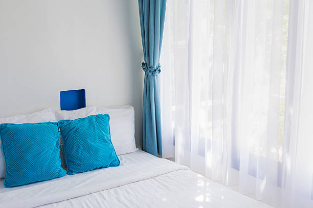 istock light blue pillows white mattress bedroom light curtain 502640460