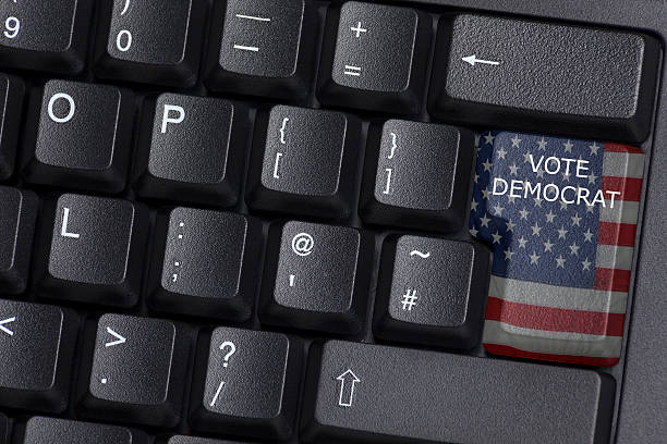 istock American flagged VOTE DEMOCRAT key on a computer keyboard 502640850
