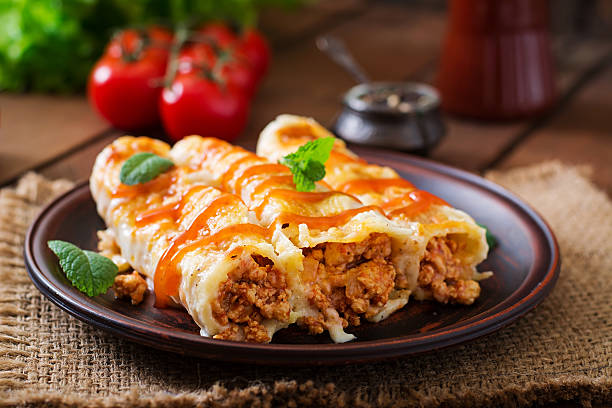 Meat cannelloni sauce bechamel stock photo
