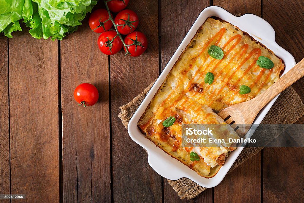 Meat cannelloni sauce bechamel. Top view Enchilada Stock Photo
