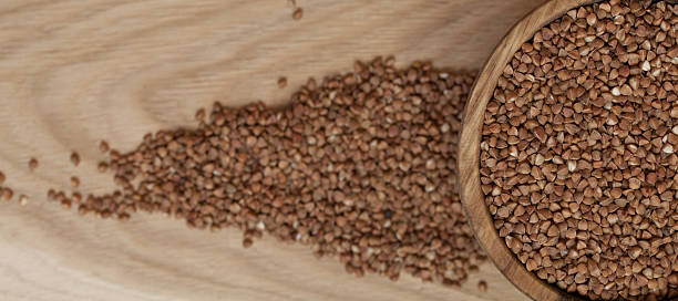 istock Buckwheat in a wooden plate 502642224