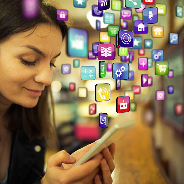 istock Apps, media and other information flying around a smartphone 502642450