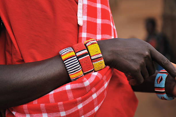 Beaded bracelets of Masai warrior close-up stock photo