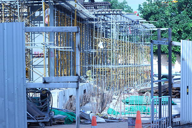 istock The unfinished building with crane and workers on top 502643940