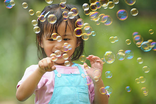 Little Asian Girl in happy face stock photo