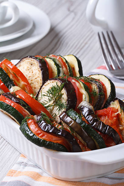 istock Baked vegetables in a baking dish closeup on the table. 502647173