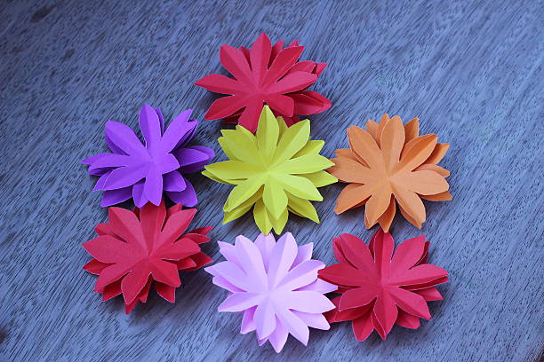 istock Artificial flowers with colorful paper 502647428