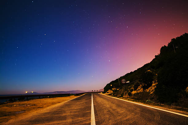 istock country road on a starry night 502647444