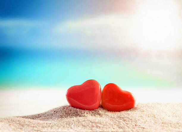 istock Two hearts on the summer beach 502647786