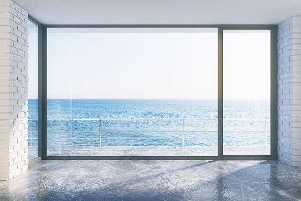 istock Empty loft style with concrete floor and ocean view 502658622