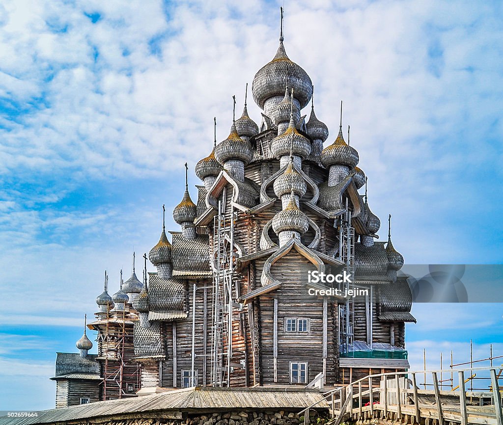 Church of the Transfiguration - Kizhi Island, Russia Built in the early 18th century, it is an octagonal spruce and pine log framework with 22 domes covered with birch bark. Kizhi Island Stock Photo