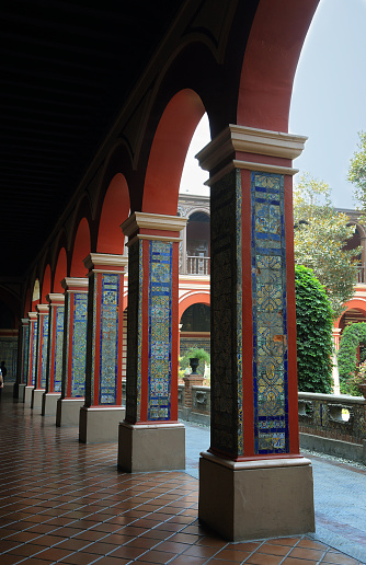 Lima, Peru - April 19, 2015: View of  columns of the first cloister of the Santo Domingo convent in Lima, Peru. The convent was built in the sixteenth century