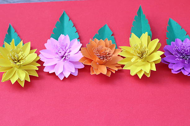 istock Artificial flowers with colorful paper 502660194