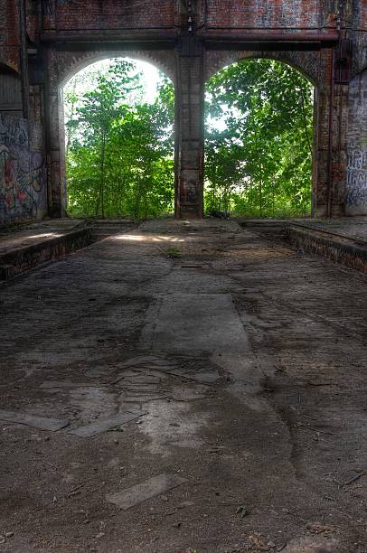 istock Abandoned hall with open doors 502660829