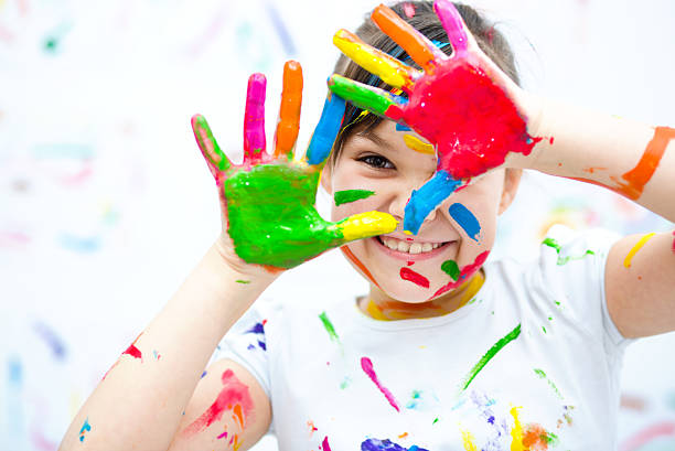 istock Cute girl playing with paints 502661088