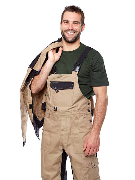 istock Portrait of smiling worker in brown uniform 502661227