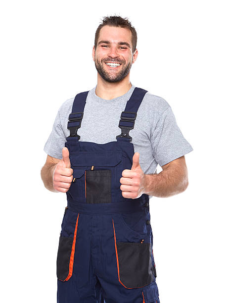 istock Portrait of smiling worker in blue uniform 502662397