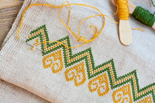 Photo of Ukrainian embroidery on the linen fabric