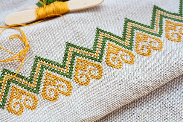 Photo of Ukrainian embroidery on the linen fabric