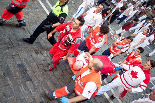 Pamplona, Spain - July 8, 2013: Providing first aid at San Fermin festival. Navarra
