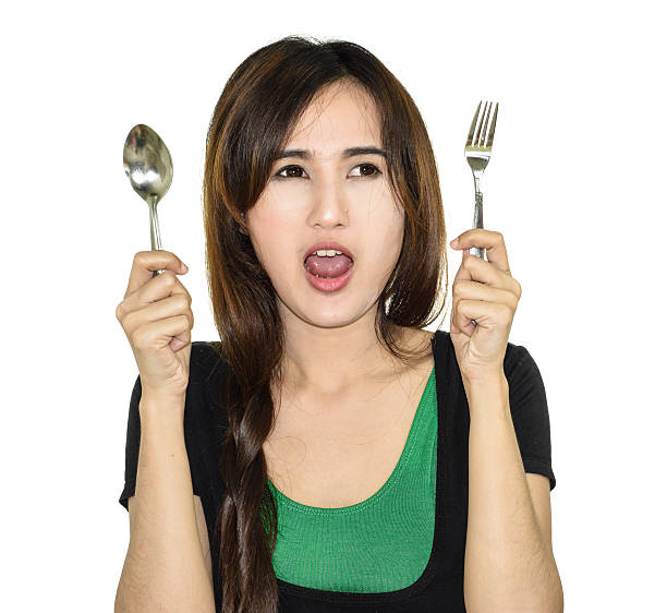 istock asia woman hungry 502664719