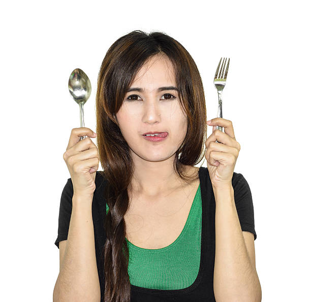 istock asia woman hungry 502664735
