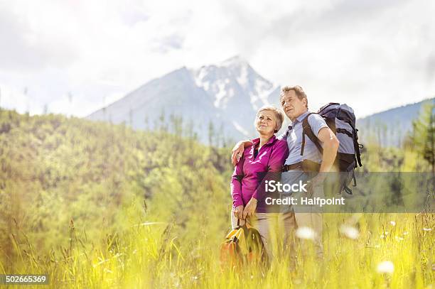 Senior Couple Hiking Stock Photo - Download Image Now - Couple - Relationship, Hiking, Active Lifestyle