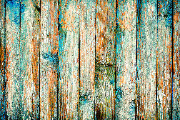 istock Rustic wooden fence purification of blue paint 502665701