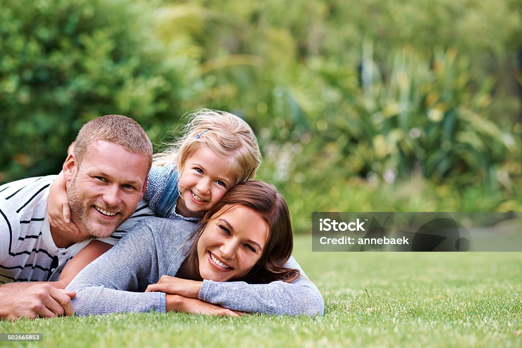 Feliz familias - Foto de stock de Acostado libre de derechos