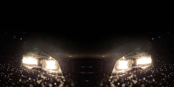 istock Close-up on a car headlight. Night. Rain 502666486