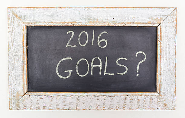 New Year Goals Planning 2016 Goals 2016 written on a framed black board. lavagna stock pictures, royalty-free photos & images