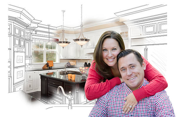 istock Couple With Kitchen Design Drawing and Photo Behind 502667496
