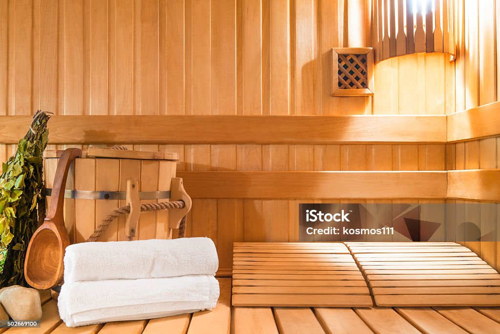 steam room made of natural wood and accessories Sauna Stock Photo