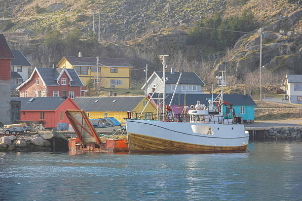 istock Boat in front of the village 502669570