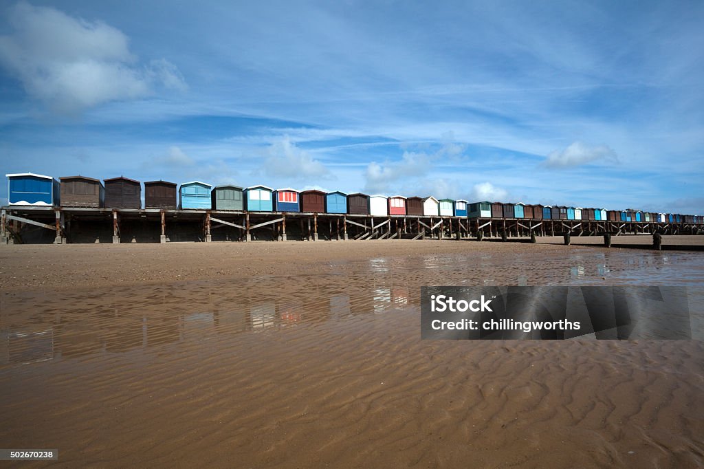 Beach Huts at Frinton-on-Sea, Essex, England Colourful beach huts at Frinton-on-Sea, Essex , England Sea Stock Photo