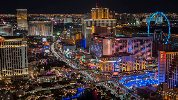 Las Vegas Strip at night - high vantage A picture of the Las Vegas strip at night taken from a high vantage point.  The view is north along the mid-strip area on December 23, 2015. the strip las vegas stock pictures, royalty-free photos & images