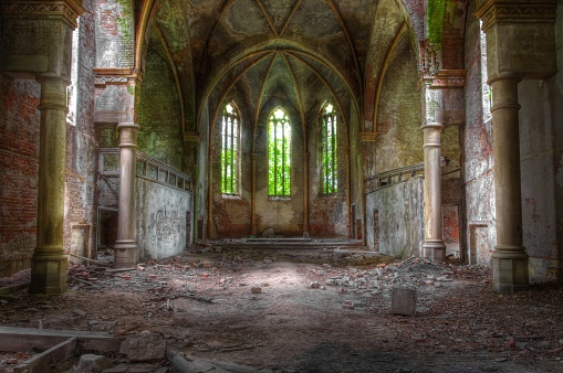 View through an abandoned church with large windows